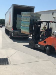 LED Lighting being unloaded from delivery truck